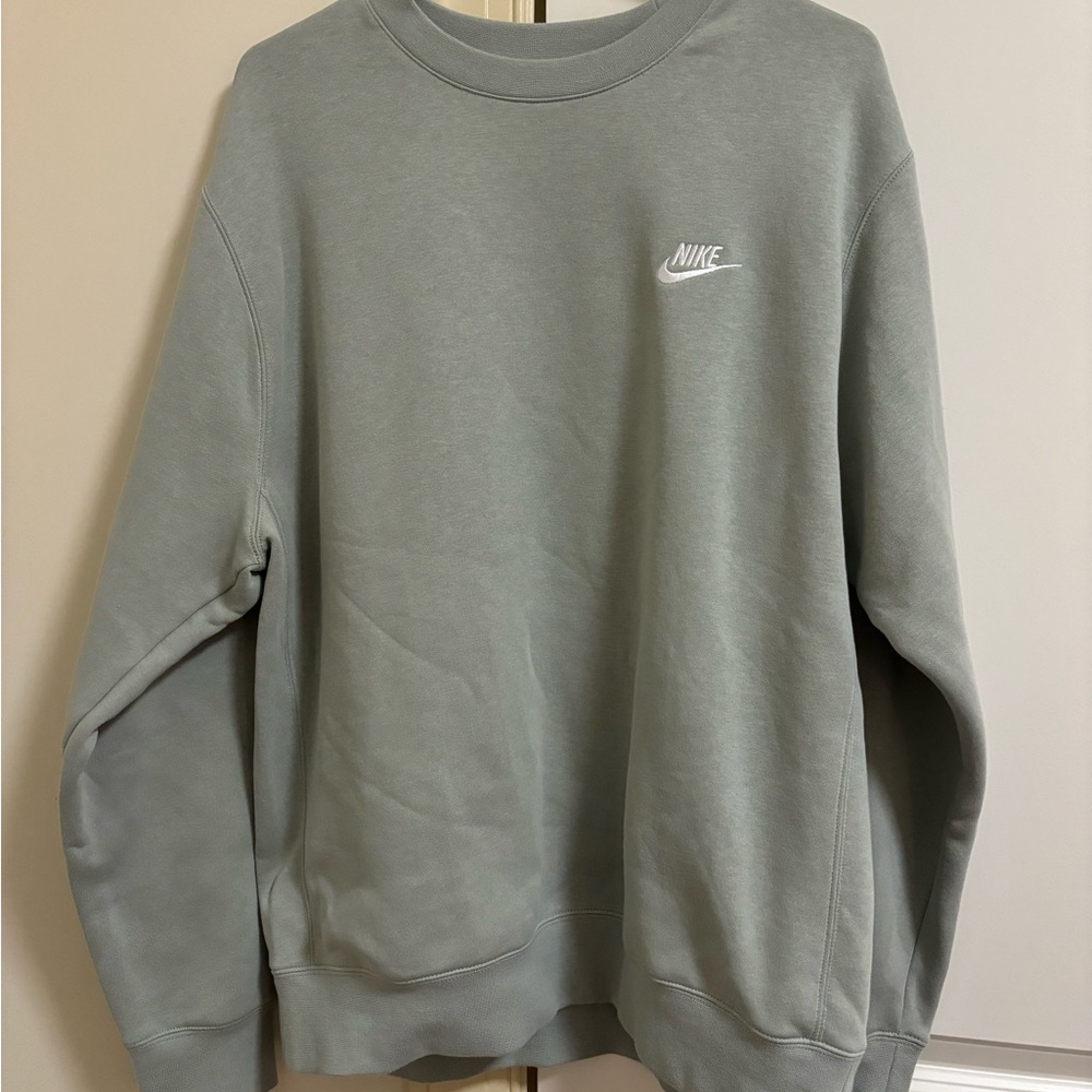 Green Nike sweatshirt with